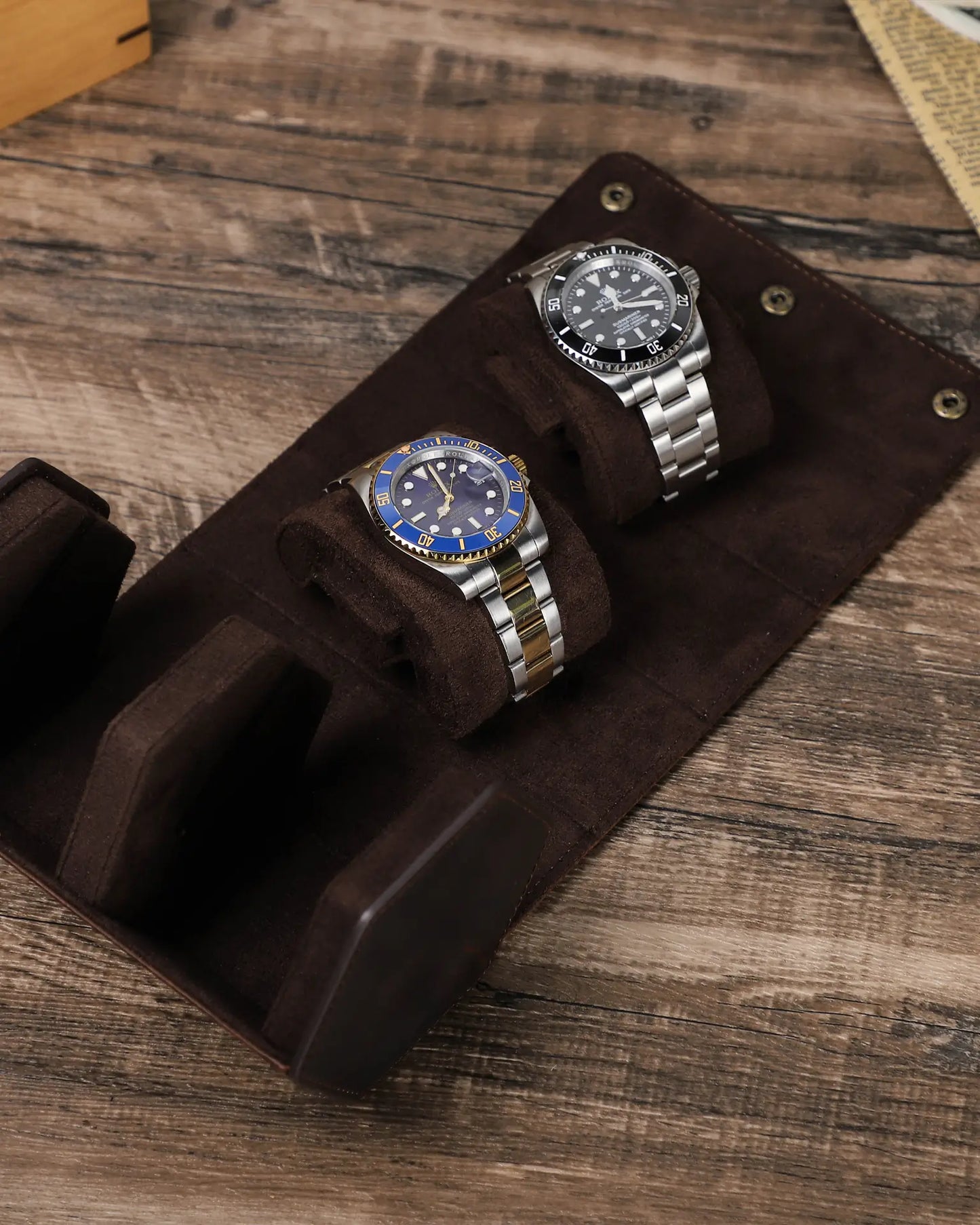 Flat lay of Legacy Hex double watch box fully open showing suede lined interior with watches