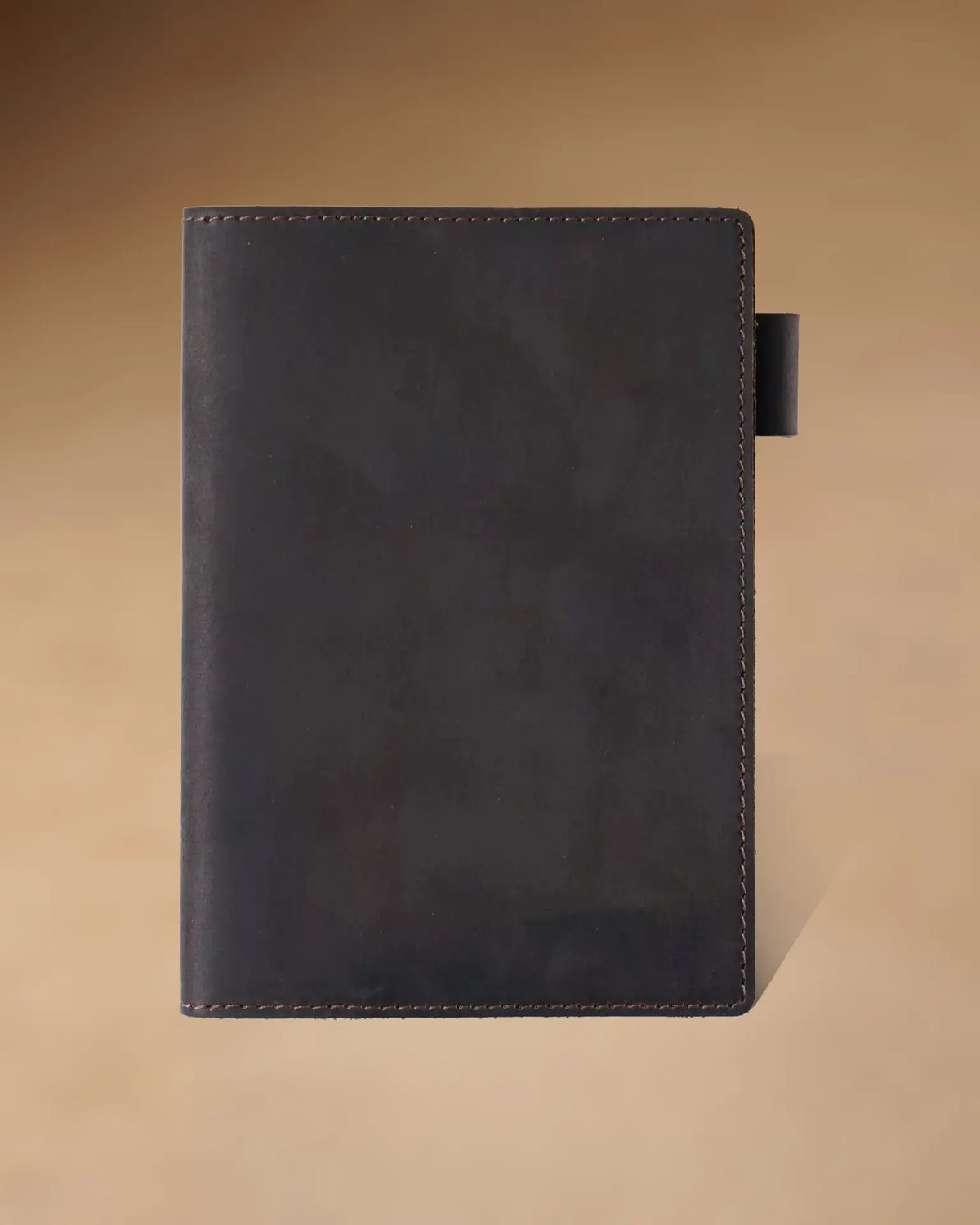 Espresso A6 leather writing folio with stitched cover and pen loop