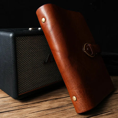 Leather journal back cover with brass snap buttons