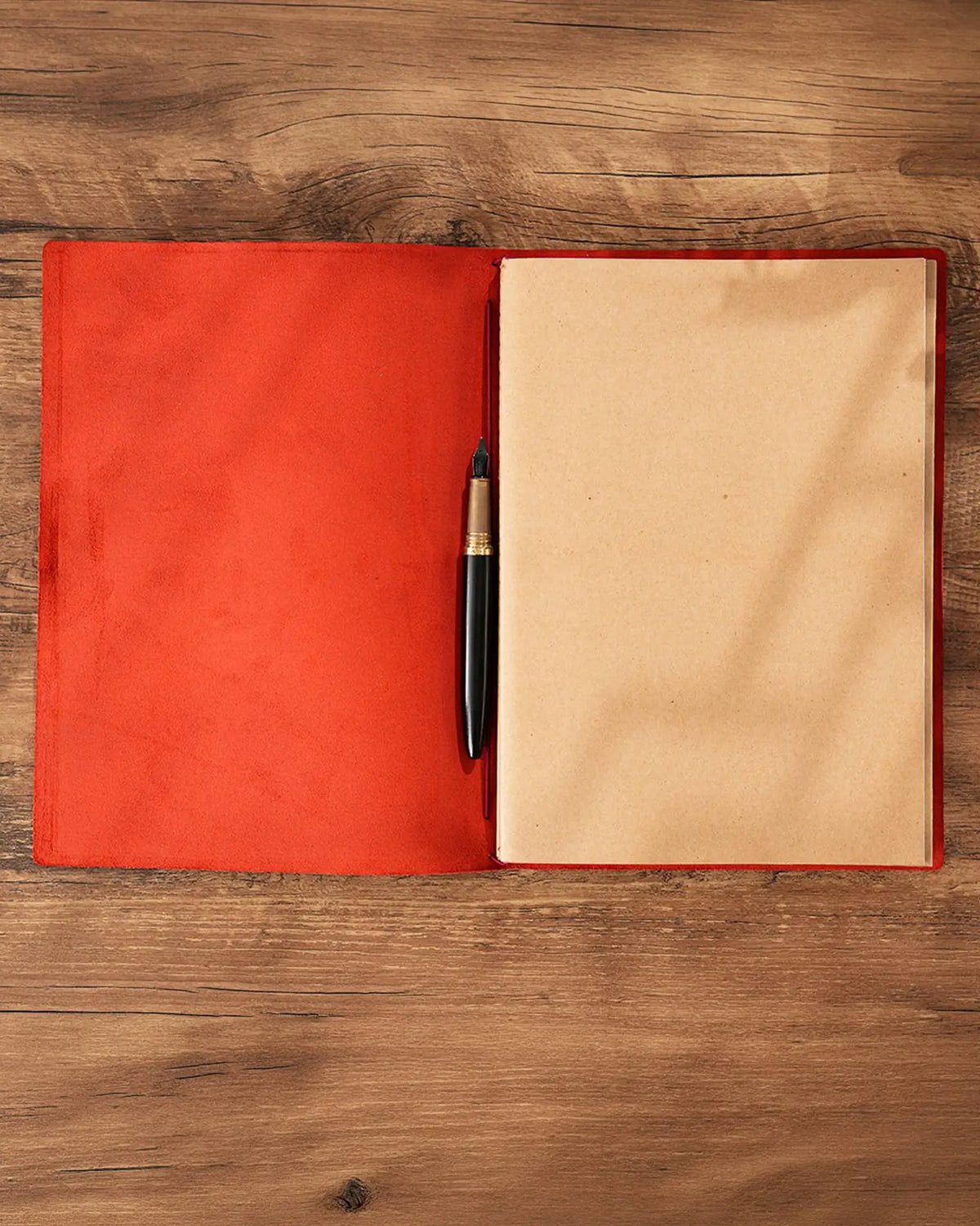 Open Crimson B5 leather traveler’s notebook with blank refill and pen holder
