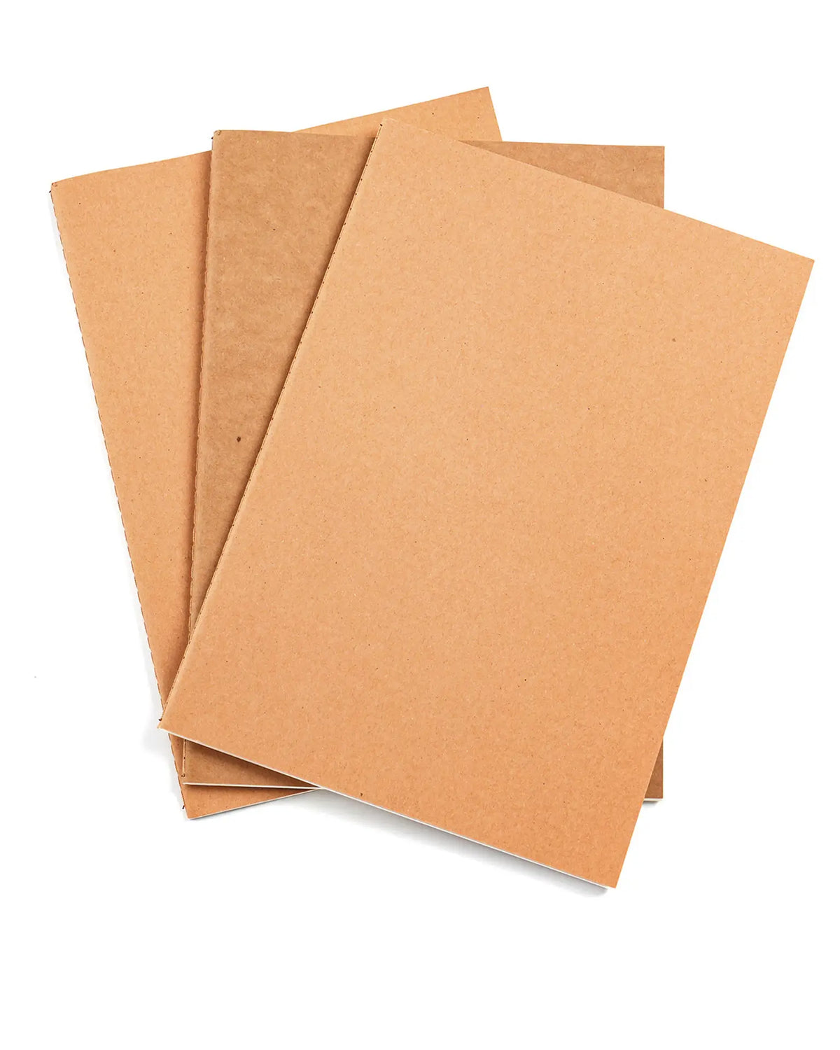 Three kraft-cover B5 refill notebooks included with the leather traveler’s journal