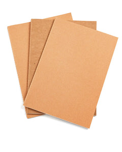 Three kraft-cover B5 refill notebooks included with the leather traveler’s journal