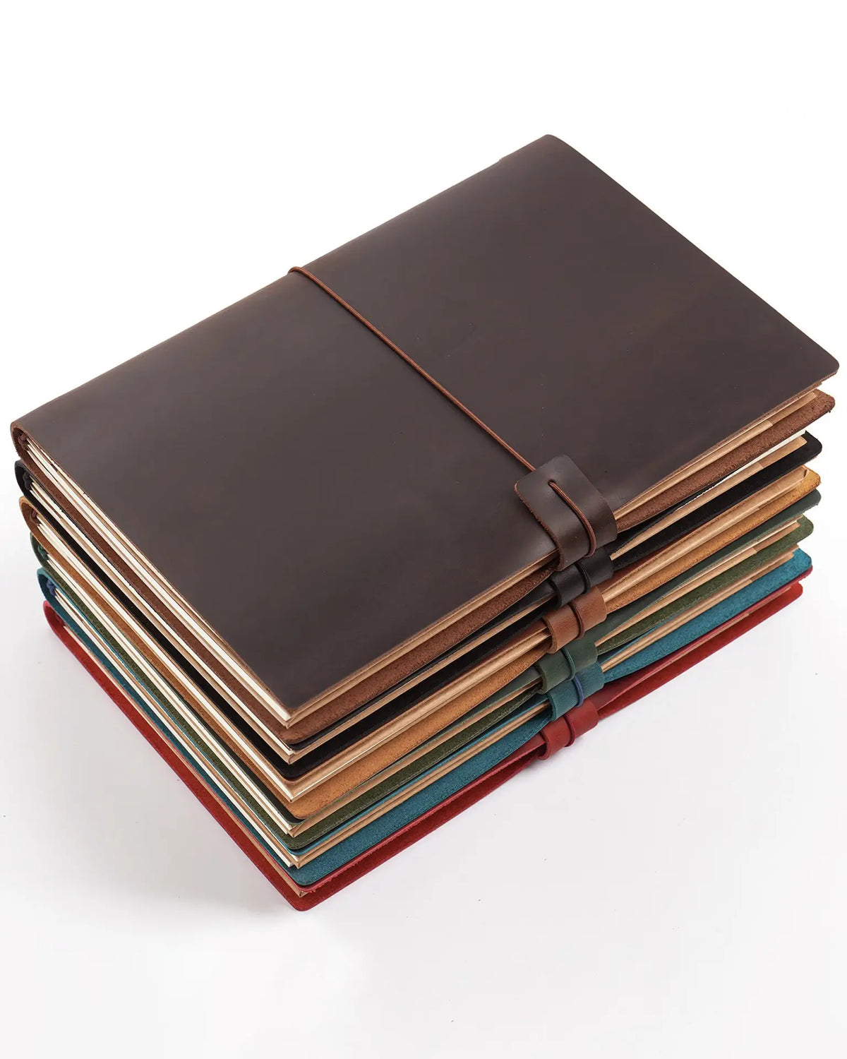 B5 refillable leather traveler’s notebooks stacked in six available colors