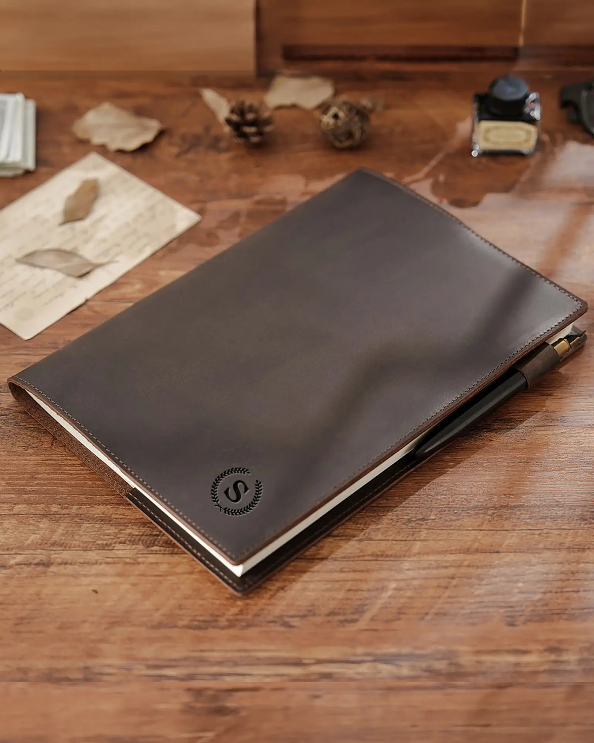 Personalized Espresso B5 refillable leather journal with engraved monogram and pen loop