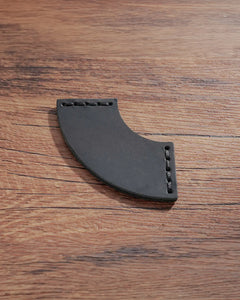 Black leather corner bookmark with curved fan shape and matching stitched ends