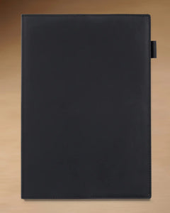 Black B5 refillable leather journal with stitched cover and built-in pen loop
