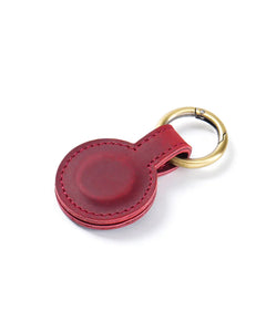 Crimson magnetic leather hat clip and bookmark with matching stitching and metal spring ring
