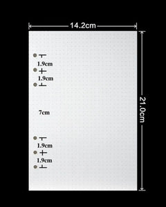 A white rectangular sheet with a fine dot grid pattern shown on a black background, with dimension annotations indicating 14.2 cm width, 21.