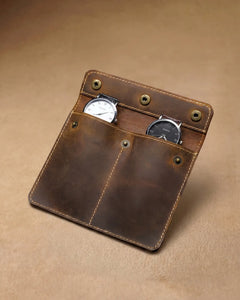Open brown double-watch sleeve holding two watches