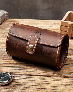 Closed personalized double-watch roll on a wooden table