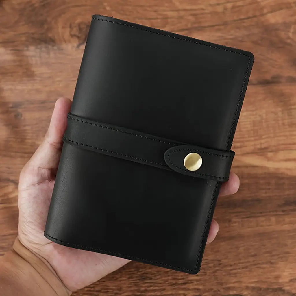 Black leather passport holder with brass snap closure handmade