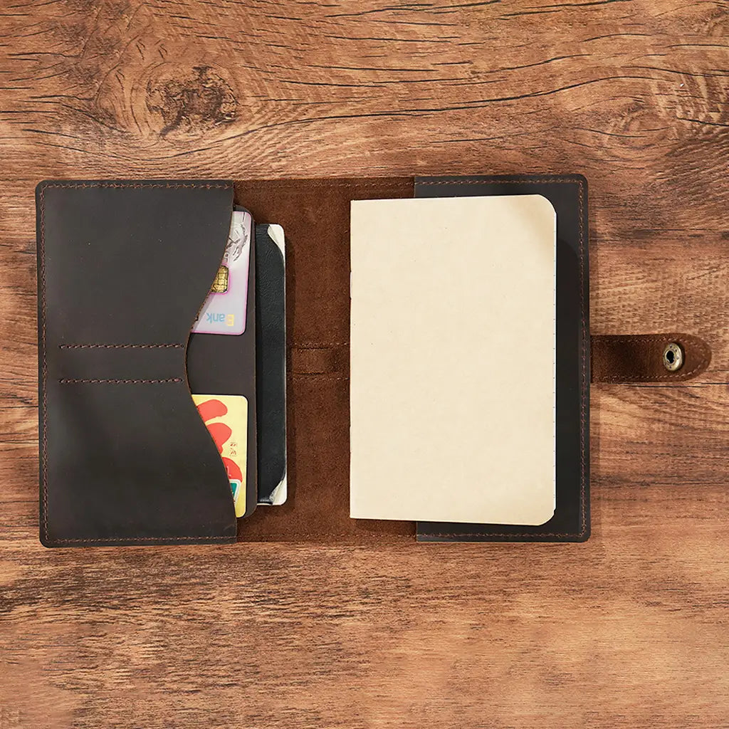Leather passport holder with refillable notebook insert