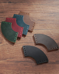 Leather corner bookmarks displayed in Black, Cognac, Crimson, Espresso, Forest Green, and Teal Blue
