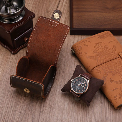 Leather watch case open showing soft suede pillow interior