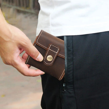 Man holding compact leather watch case showing pocket-friendly size