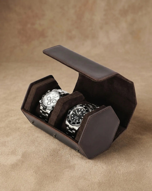 Legacy Hex double watch box open showing two luxury watches on suede pillows