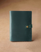 Closed forest green refillable A5 journal