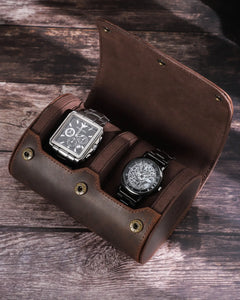 Open double-watch roll holding two watches on a tabletop