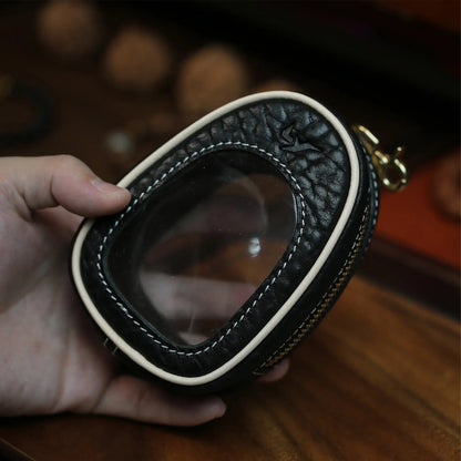 Handmade black full grain leather pouch with clear oval window and YKK brass zipper