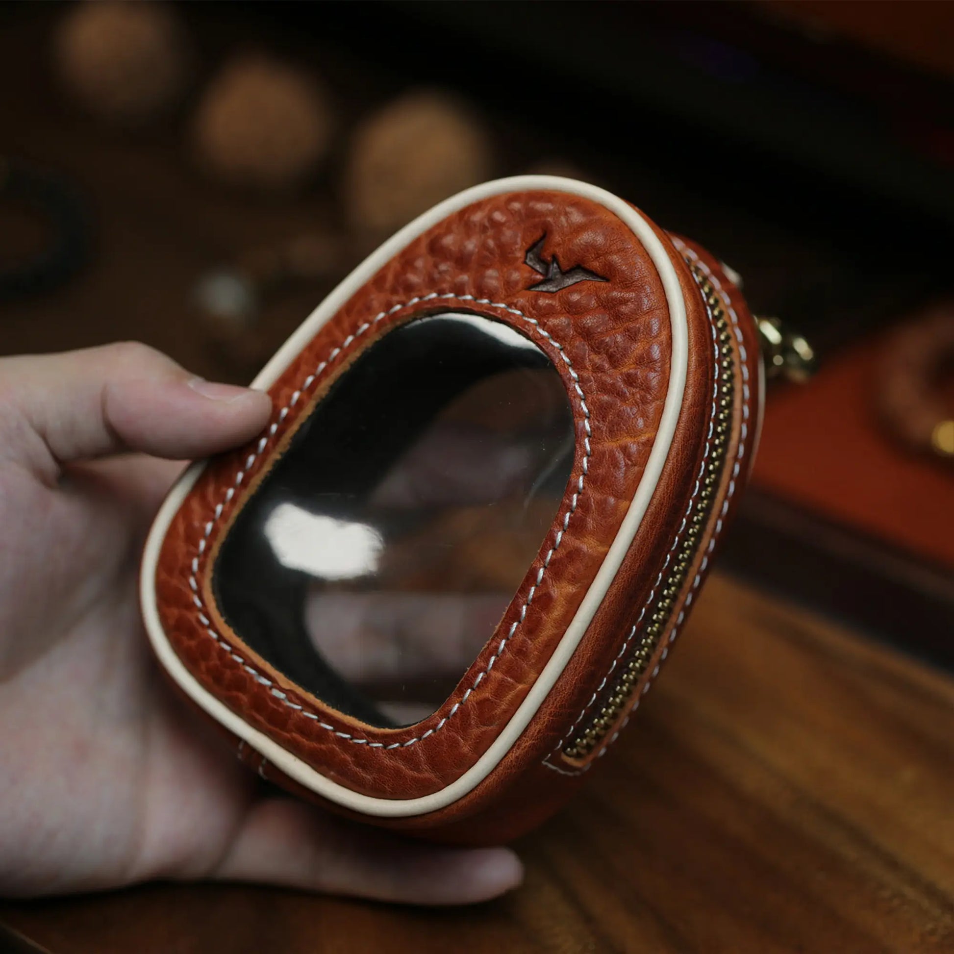 Brown handcrafted leather rosary pouch with transparent top window and white stitching