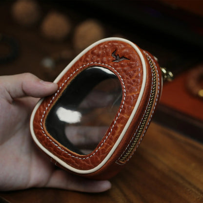 Brown handcrafted leather rosary pouch with transparent top window and white stitching