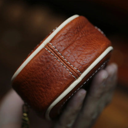 Hand-stitched white waxed thread detail on full grain leather window pouch by BygoneMark