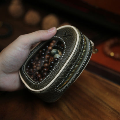 Handmade full grain leather window pouch open showing black suede interior lining