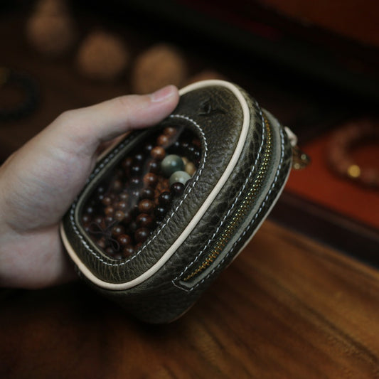 Handmade full grain leather window pouch open showing black suede interior lining