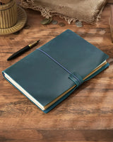 Teal Blue B5 refillable leather traveler’s notebook with elastic closure