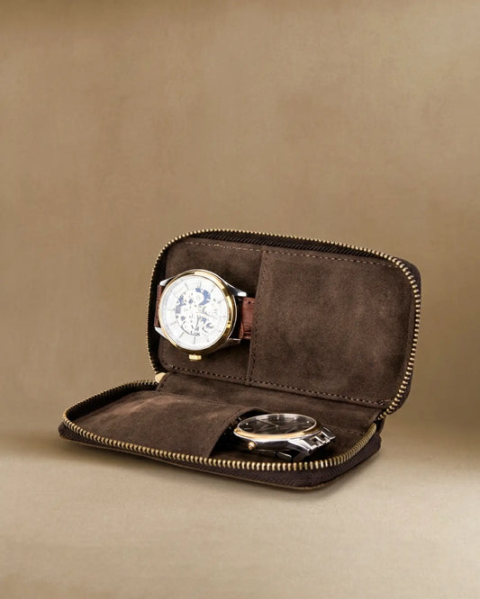 Brown crazy horse leather travel watch pouch with two watches inside showing suede interior