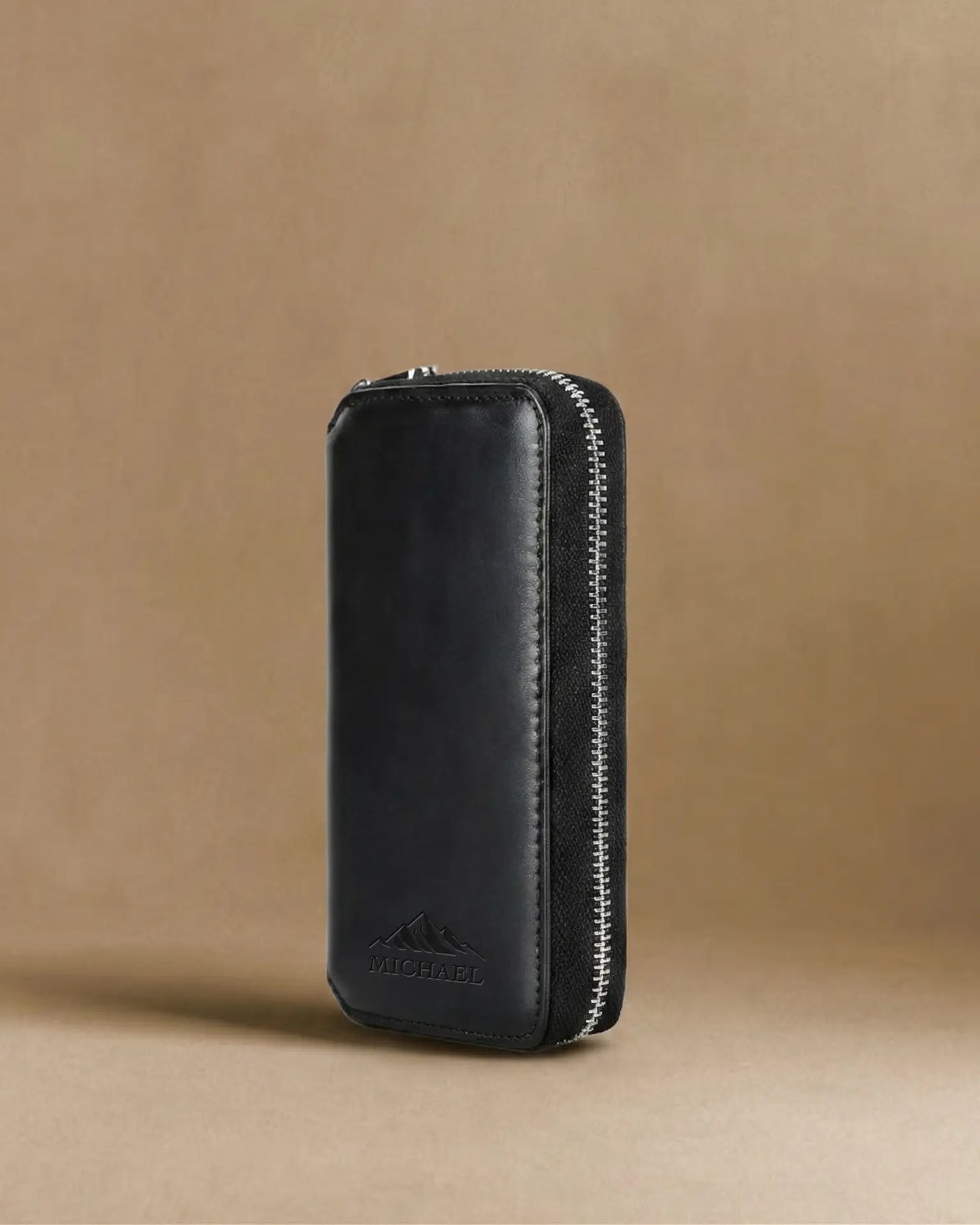 Black crazy horse leather watch pouch standing upright with personalized name engraving