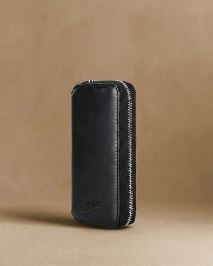 Black crazy horse leather watch pouch standing upright with personalized name engraving