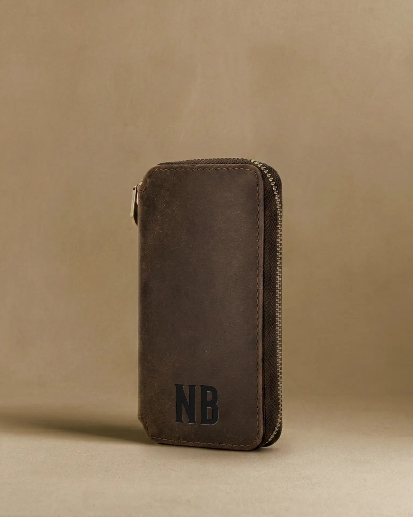 Brown leather travel watch case with custom monogram initials engraved