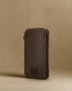 Brown leather travel watch case with custom monogram initials engraved