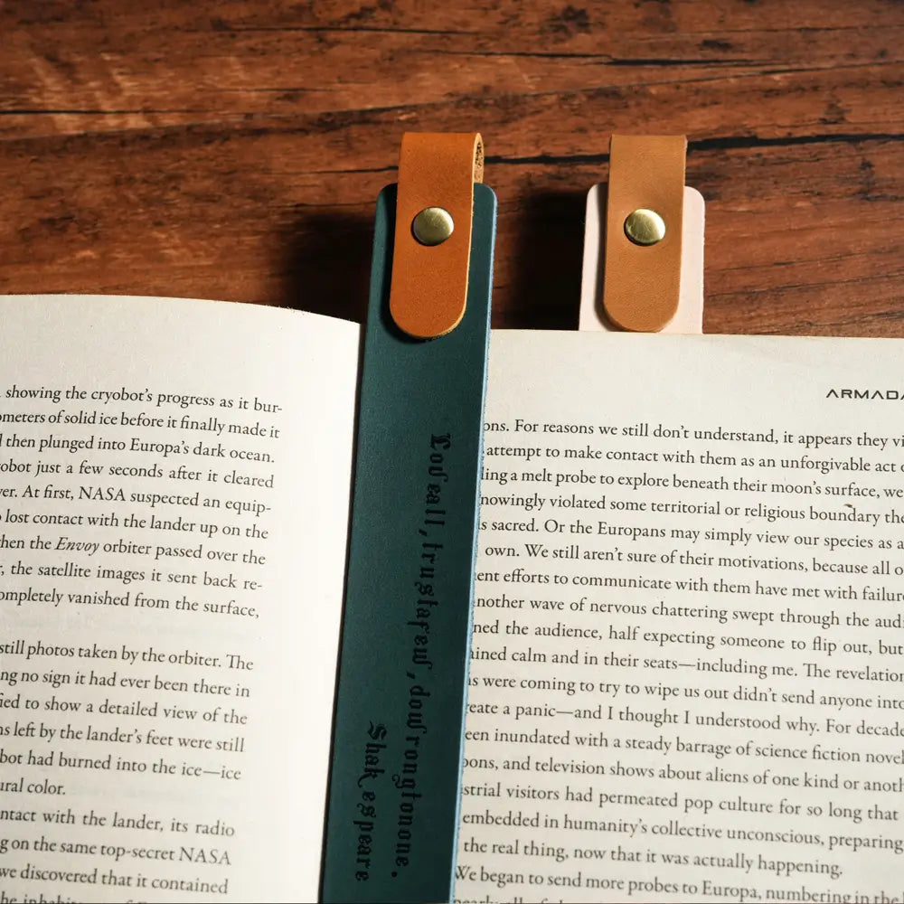 Personalized leather bookmark on open book