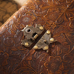 Antique brass lock clasp on vintage leather journal