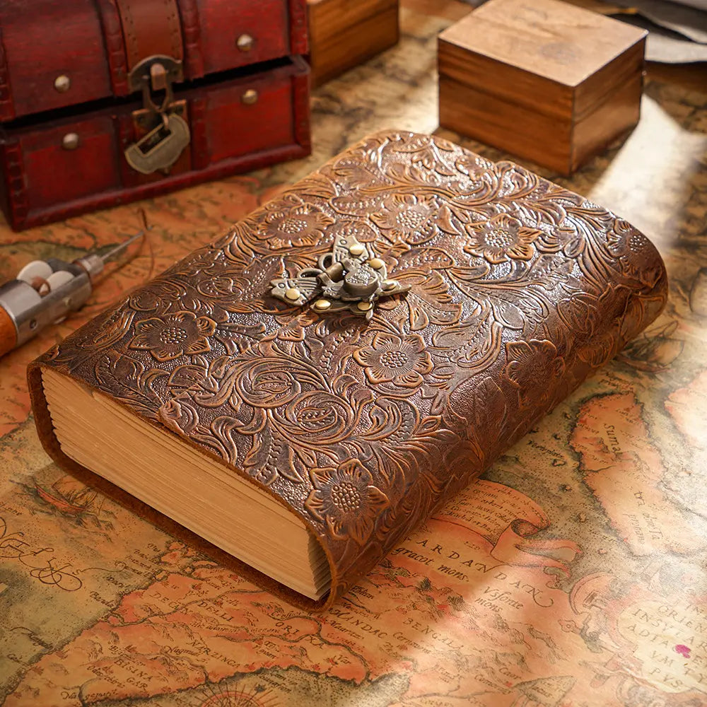 Carved brown embossed leather journal with lock