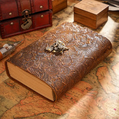 Carved brown embossed leather journal with lock