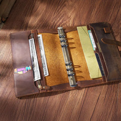 Leather journal open showing 192 cream pages