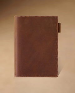 Cognac A6 leather writing folio with stitched cover and pen loop