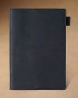 Black A5 leather writing folio with stitched cover and pen loop