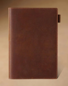Cognac A5 leather writing folio with stitched cover and pen loop