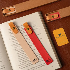 Personalized leather bookmark on open book page