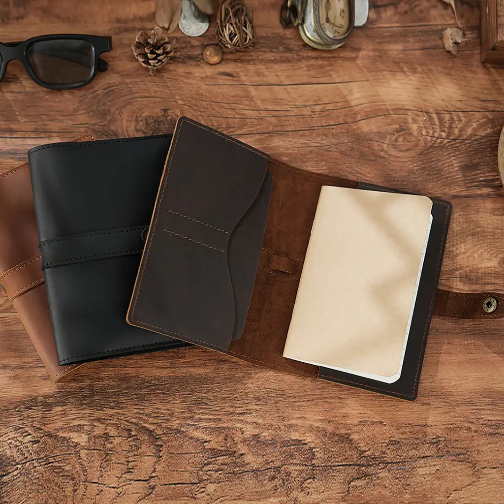 Leather passport holder with refillable notebook insert