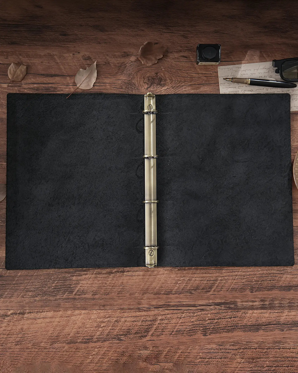 Legacy Floral A5 leather ring-binder journals in Black Cognac Purple and Espresso