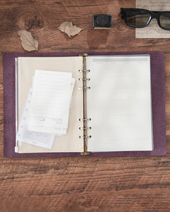 Purple Legacy Floral A5 leather ring-binder journal open to show six-ring interior