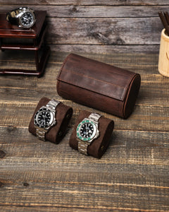 Two removable watch cushions displayed in front of the closed Espresso double watch roll.