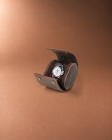 Open Legacy Hidden Snap Single Watch Roll in Espresso, with a watch on the cushion and two snap closures visible.