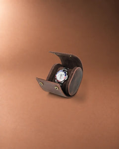 Open Legacy Hidden Snap Single Watch Roll in Espresso, with a watch on the cushion and two snap closures visible.