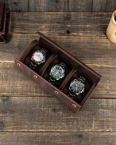 Top view of the open triple watch roll with three cushions separated by two interior dividers.